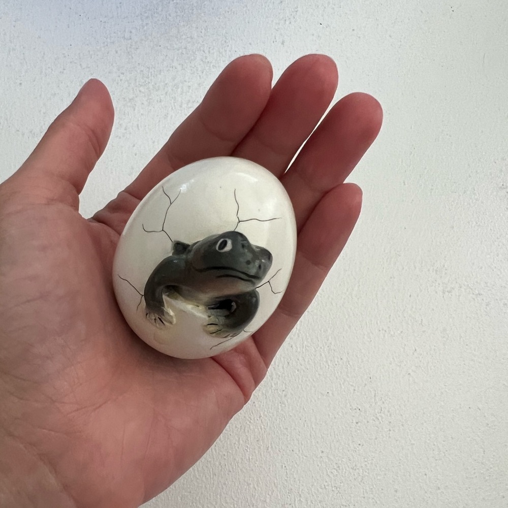Egg art of reprisal coming out of egg